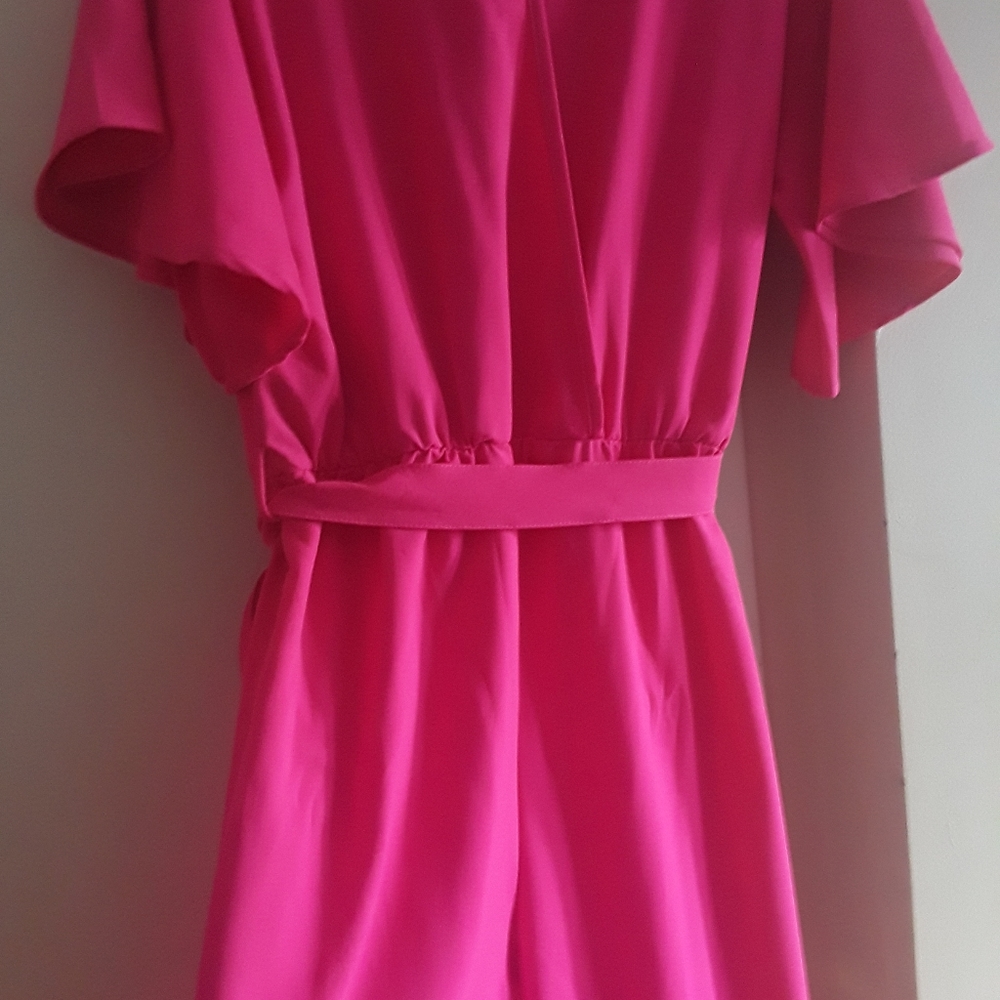 Hot pink  belted jump suit, with wide legs
